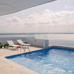 Apartamento familiar 2 Habitaciones, Vista Ciénaga Rooftop Piso 17 Cielo Mar Cartagena